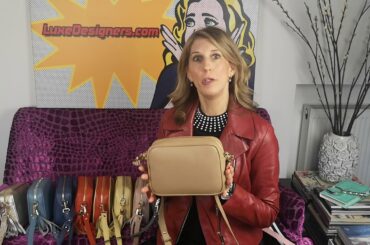 The cute compact cross-body handbag is on the couch with Margaret Cabo founder of LuxeDesigners.com