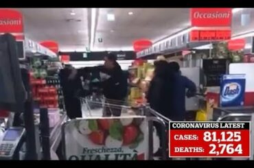 Shoppers fight over food in supermarket within Italy's 'red zone'