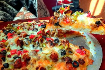 How to make pizza|| home made pizza recipe in malayalam #chiksho #pizza