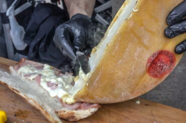 Italian Baked Sandwiches Drenched in Raclette Cheese. The "Panuozzo" from Naples. London Street Food