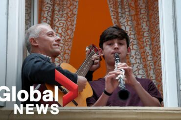 Coronavirus outbreak: Italian residents join together to sing from balconies during lockdown