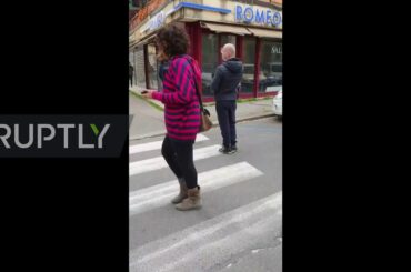 Italy: Shoppers keep safe distance outside supermarkets due to coronavirus fears