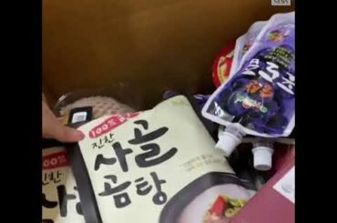 Volunteers in South Korea deliver boxes of food to people in self-quarantined people | ABC News