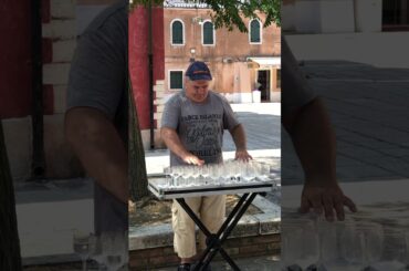 Murano Island, Italy .Music made from Wine glass