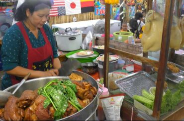 Thai Street Food in Bangkok. Grilled Meat, Fish and more Food at Talad Neon Night Market. Thailand