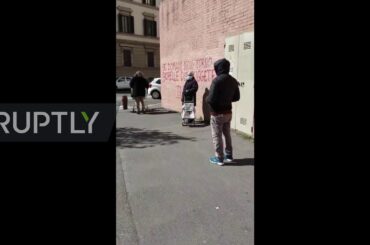 Italy: Shoppers form long queues outside Florence supermarket amid coronavirus restrictions