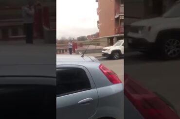 Italian walking a fake dog (coronavirus)