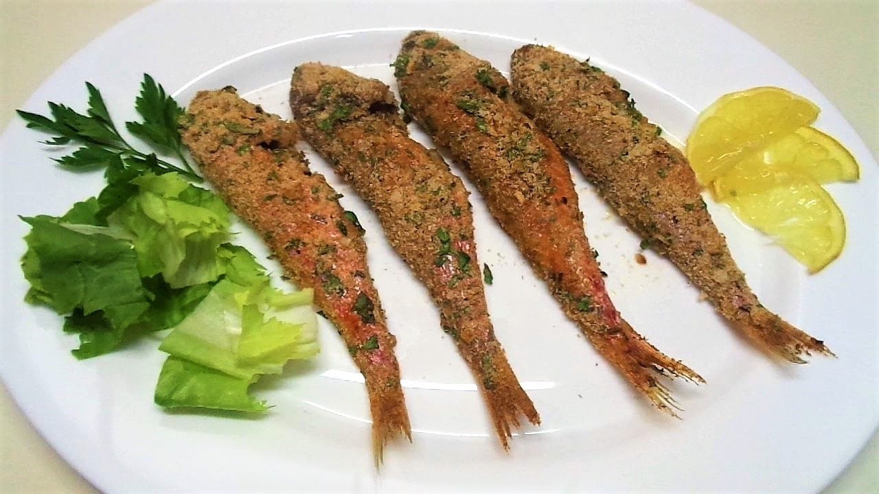 Delicious Baked Fish. Red Mullet fish in the oven Italian Food. Fish