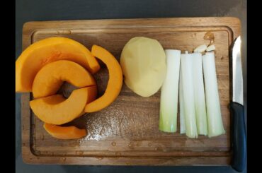 Italian man cooks pumpkin soup