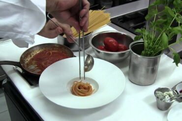 Trovato makes a pasta dish at 2 Michelin Arnolfo