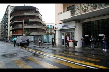 Mafia distributes food to Italy's struggling residents