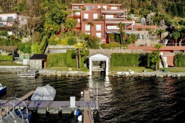 Beautiful penthouse apartment in Barbengo, Switzerland, for sale with lake view & pool