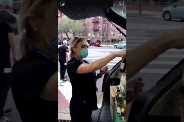 New York Sanitation Worker Gifts Wine to Nurses Outside Elmhurst Hospital