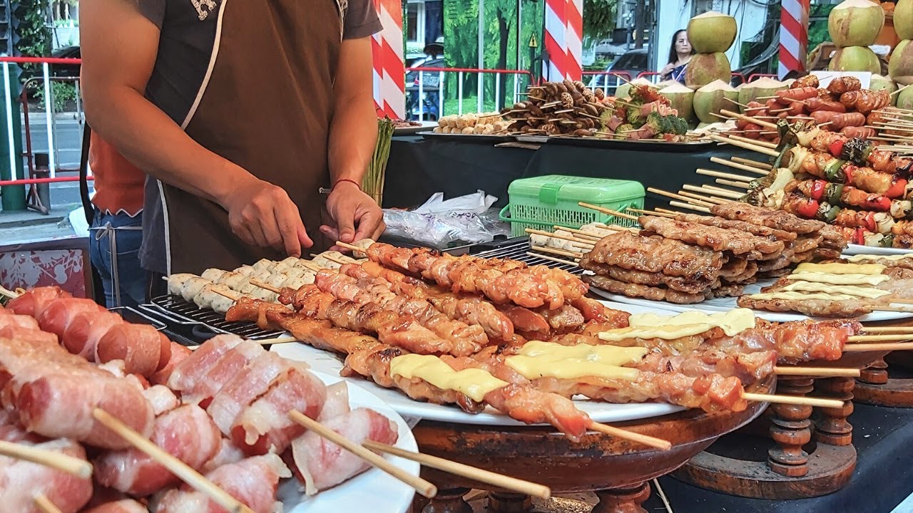 Bangkok Street Food. Grilled Meat, Fried Fish and more Food around Amarin Plaza, Thailand Bangkok Street Food. Grilled Meat, Fried Fish and more Food around Amarin Plaza, Thailand