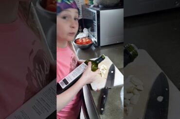 Coco makes Italian Sausage Tomato and Spinach Pasta