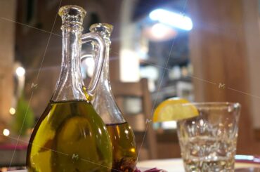Bottles of olive oil in Italian restaurant