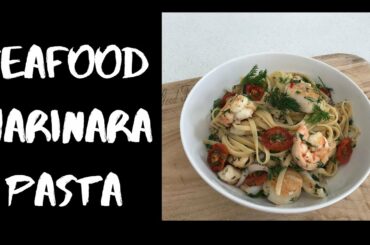 Seafood marinara pasta with white wine garlic sauce