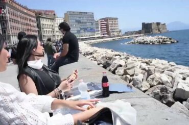 Coronavirusitaly Italian eating pizza at seaside