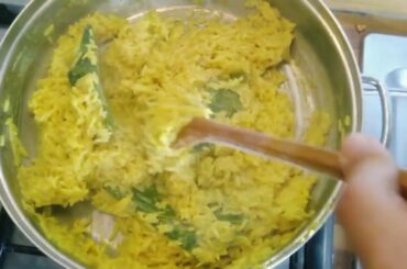 Nasi Kuning Pampis Tuna ( Minahasan Yellow Rice) cooking in Italy