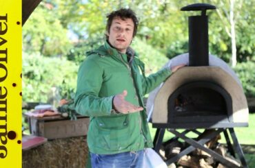 Jamie Oliver shows you how to cook pizza in a wood fired oven