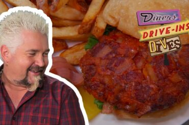 Guy Fieri Tries a Bacon and Blue Cheese Stuffed Burger (from #DDD) | Food Network