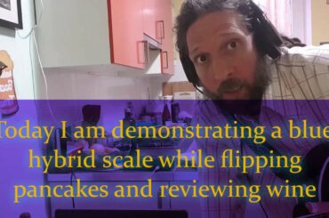 Blues Player Flips a Pancake While Jamming Guitar and Doing a Wine Review.