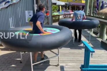 Seafood restaurant puts diners in "bumper boat" tubes to ensure social distancing
