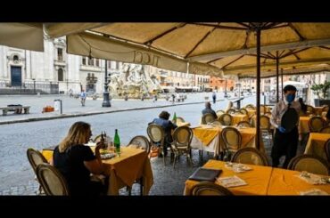 Italy's restaurants, shops caught between rock and hard place