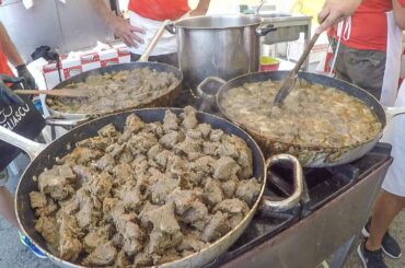 Italy Street Food. Beef Stew, Sausages, Blue Cheese, Corn 'Polenta'. Sagra delle Sagre. Asti