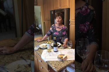Momma shows off the creamy mushroom risotto and pairs it with wine.