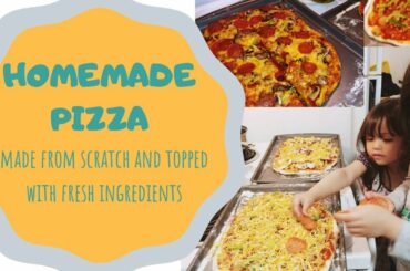 Helping mommy make homemade pizza