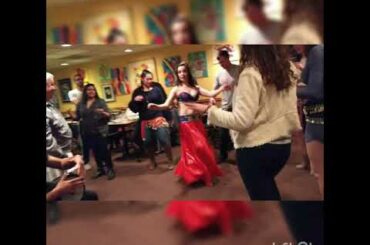 Zainab dancing shik shak shok at Nicola's restaurant 2019