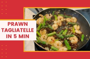 Under five minutes Prawn, Asparagus and Sun Dried Tomatoes Tagliatelle topped with toasted pine nuts