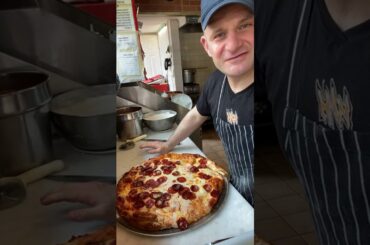 Making triple stacked pizza..