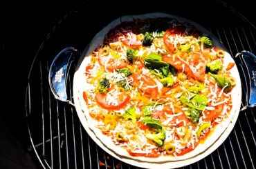 Yummy Wood fire Pizza in a Pit Barrel