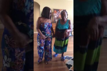 Old lady learning to “wine”, Trinidad style.