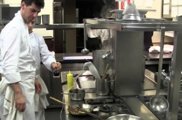 Alajmo cooks a main dish at his 3 Michelin Le Calandre