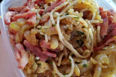 Camping food spagetti with bacon, onion and eggs