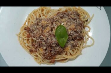 Italian cooking - bolognese. Cocina Italiana - espagueti boloñesa.