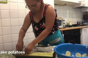 Buhay Italy cooking pork ribs,macarone,and potatoes.