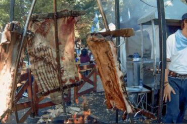 Italy Street Food Festival. Huge Asado, Mixed Meat on Grill, Angus and more Food from the World