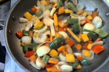 Cooking Smoked Sausage in Italian Dressing with Peppers and Onions