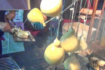 Milan Street Food, Italy. Angus, Lamb Skewers, Melted Cheese, Grilled Octopus, Poffertjes