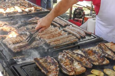 Italy Street Food. Huge Grills Overloaded with Ribs, Sausages and More Meat. Pepero Festival