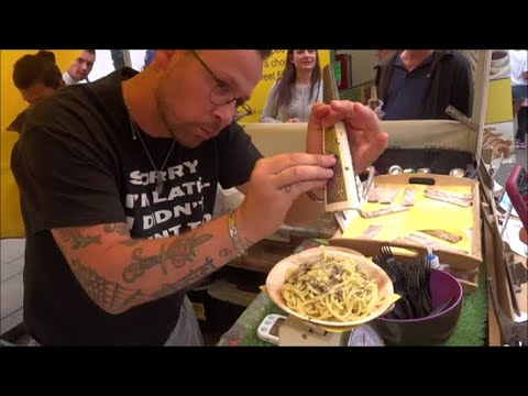 BLACK TRUFFLE PASTA IN PARMESAN CHEESE WHEEL, BRICK LANE MARKET, LONDON STREET FOOD BLACK TRUFFLE PASTA IN PARMESAN CHEESE WHEEL, BRICK LANE MARKET, LONDON STREET FOOD