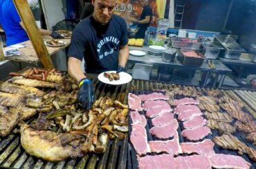 Argentina Street Food. Huge Grills Roasting Ribs, Sausages, Asado and more Meat. Italian Fairs