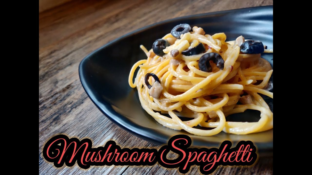 Mushroom Olive Garlic Spaghetti in Creamy White sauce Recipe – Italian Pasta Recipe Mushroom Olive Garlic Spaghetti in Creamy White sauce Recipe - Italian Pasta Recipe