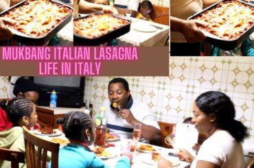 NIGERIA FAMILY EATING ITALIAN LASAGNA: LIFE IN ITALY