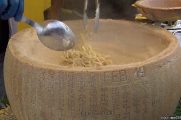 Italian Truffle Pasta in Real Parmigiano Cheese Wheel. London Street Food