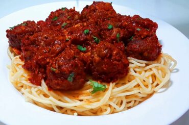 How To Make Spaghetti and Meatballs Italian Recipe by spoon of spices